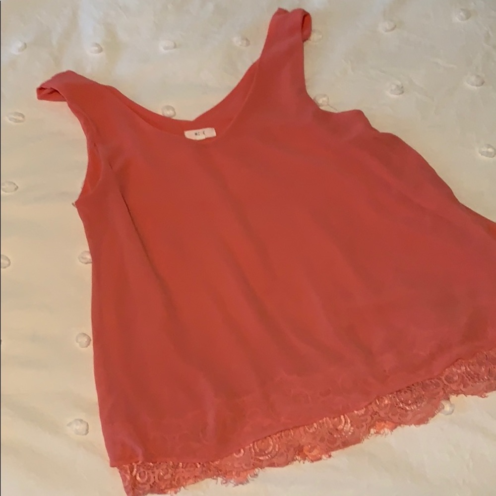 Pink blouse with lace trim